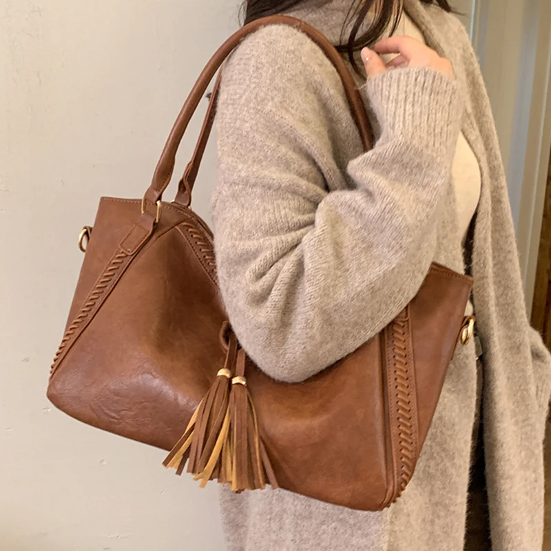 أنيقة المرأة شرابة حقائب كتف واحدة الكورية الرجعية VersatilePU حقائب عادية سعة كبيرة حقيبة تسوق سفر 2026 الاتجاه الجديد