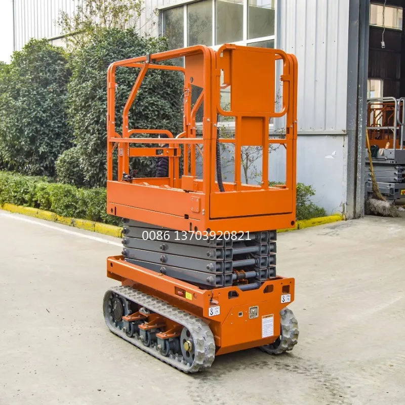 Hochwertige Rough Terrain Electric/Diesel Man Lift Raupenbetriebene Raupen-Scherenhebebühne zum günstigen Preis im Angebot