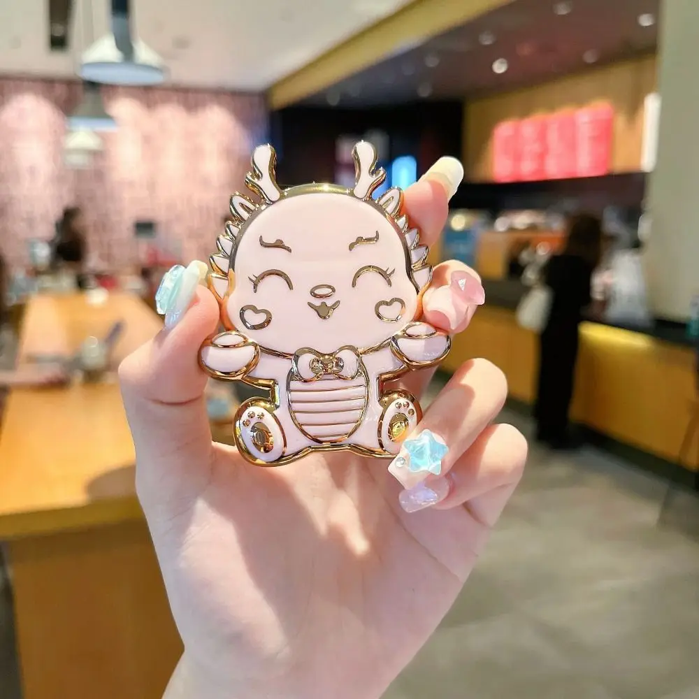 Supporto per telefono cellulare Cartoon Dragon Supporto per telefono da tavolo pieghevole pieghevole in metallo Supporto per telefono da tavolo per animali portatile