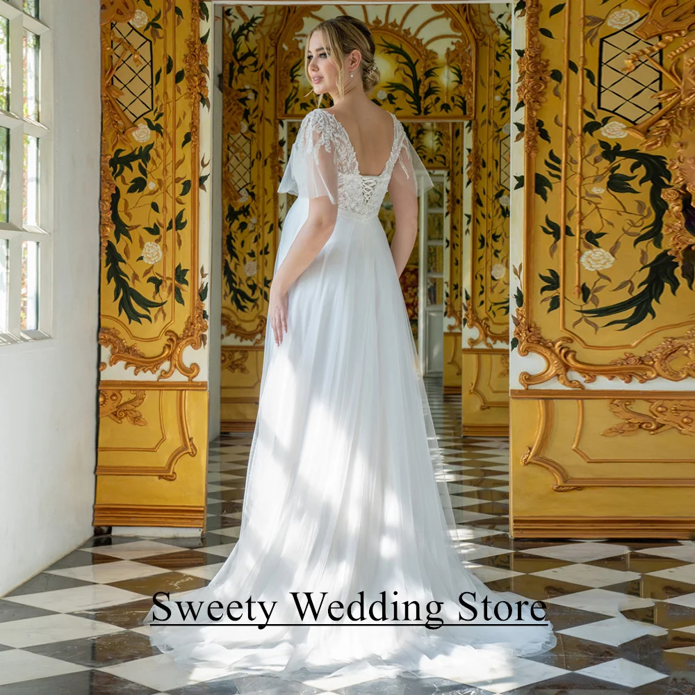 فستان زفاف العروس الحامل مخصص الخامس الرقبة مضيئة الأكمام الديكور زين تول ألف خط قطار الاجتياح مشد فستان زفاف
