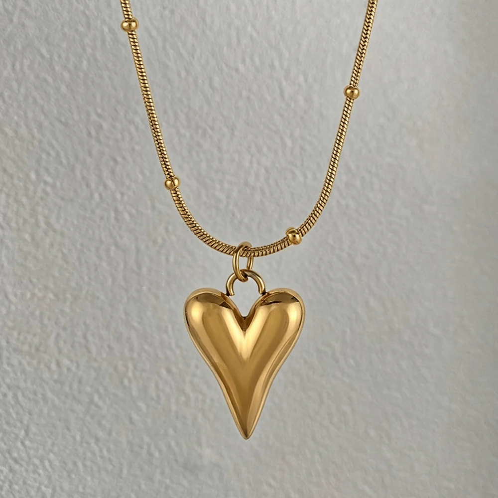 Colar com pingente em forma de coração, feito de aço inoxidável à prova d'água, da marca Yupsk, para mulheres, um acessório de moda e joia moderna, ideal para oferecer como presente.