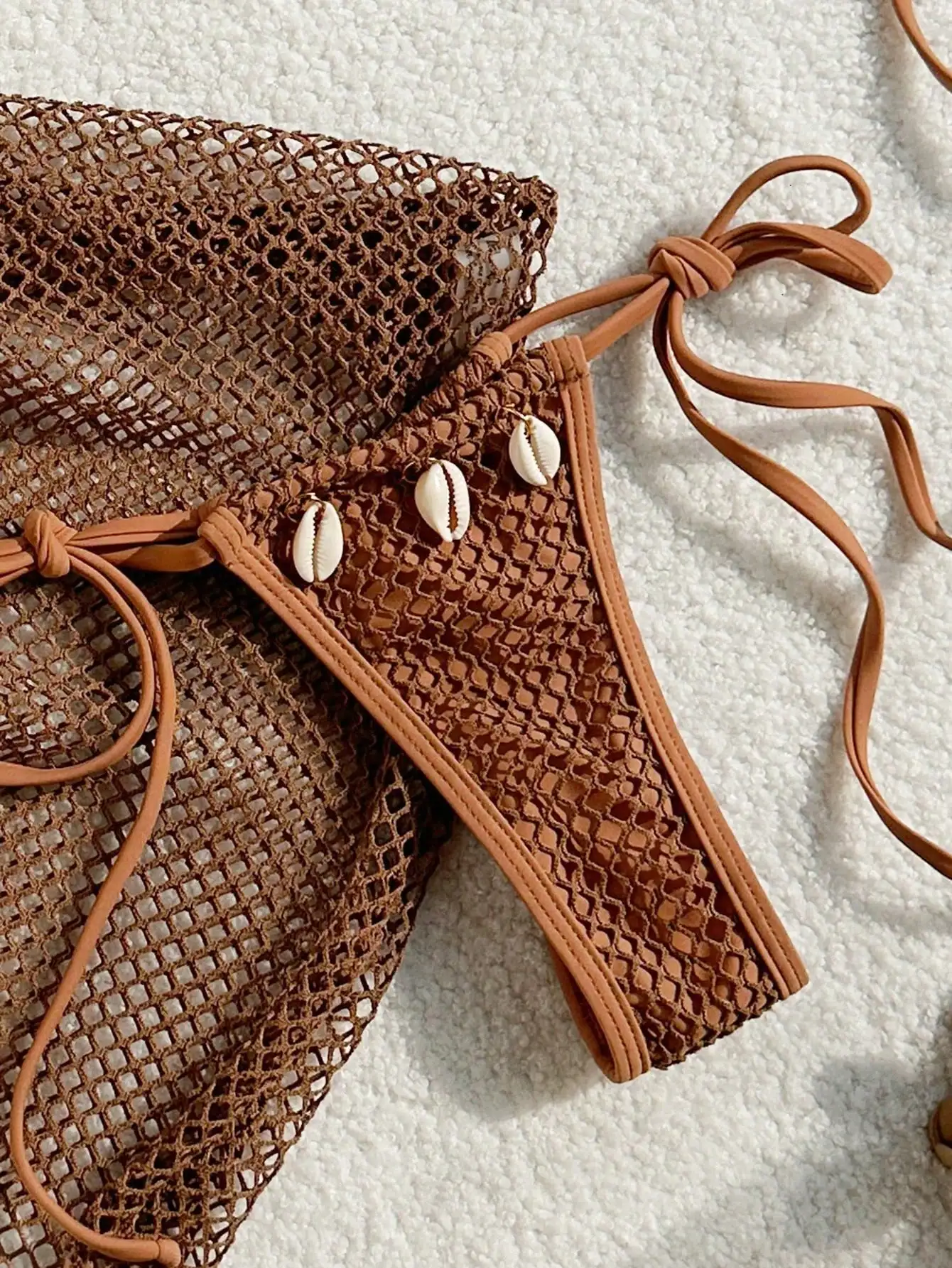 

Tan Crochet Triangle Bikini With Cowrie Shells, Adjustable Straps, And Matching Mesh Cover-Up Skirt