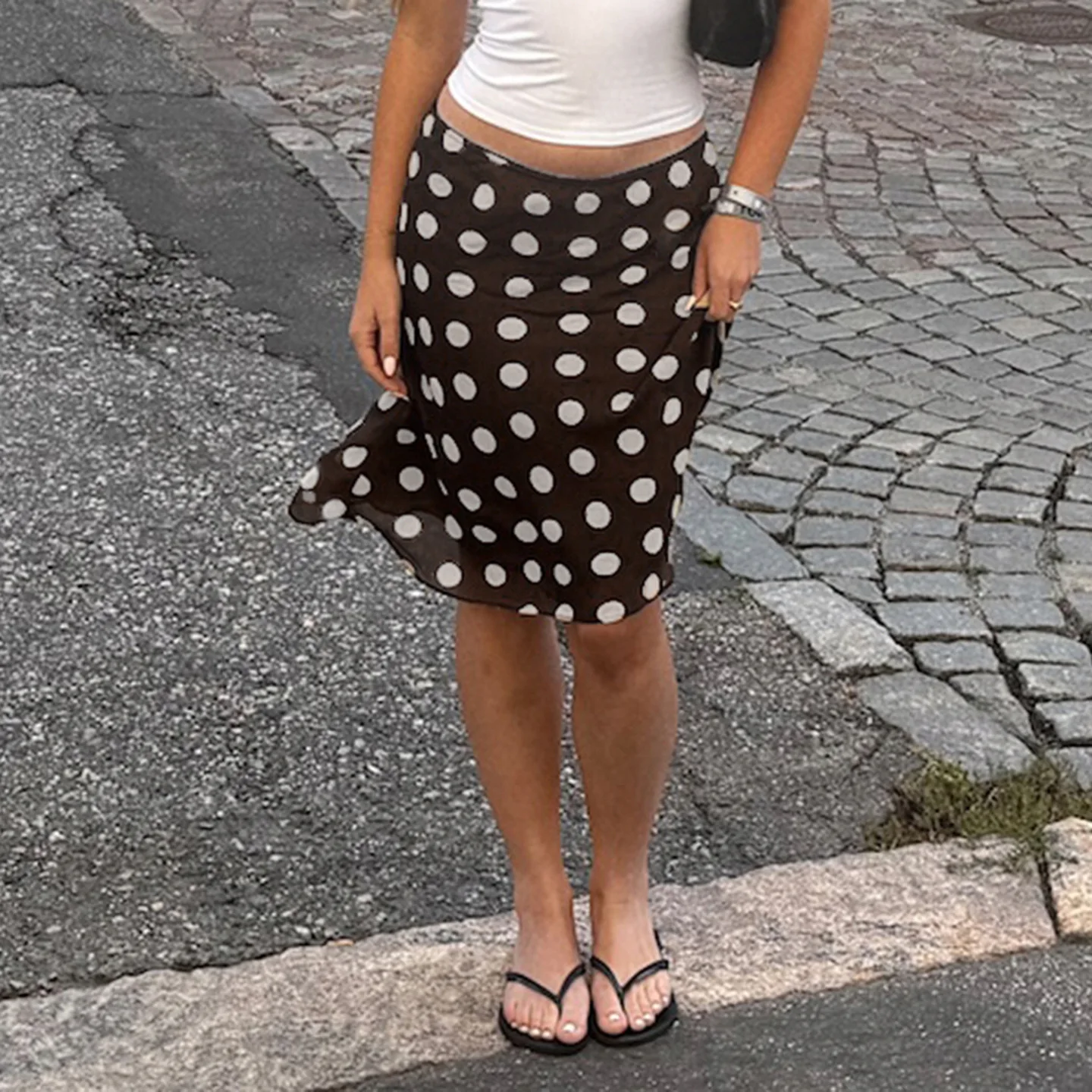 

European and American fashion polka-dot printed mesh stitching spice girl overskirt temperament elegant low waist A-line skirt.