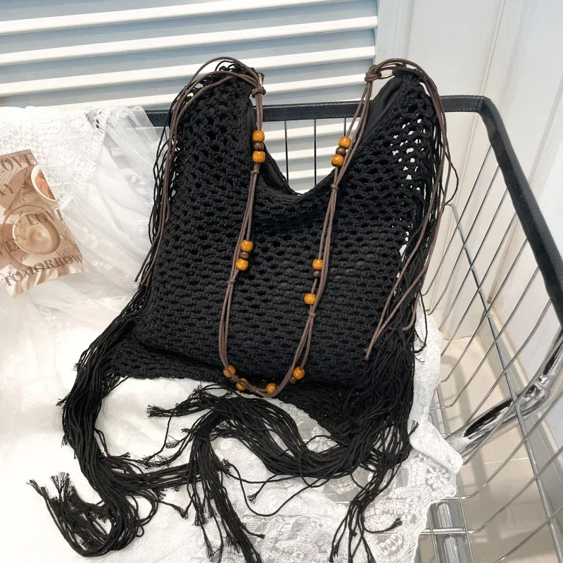 

Bohemian Large Capacity Crochet Beach Handbag Weaving Travel Handbag Ladies 2025 Summer Designer Tassel Shoulder Tote Bag