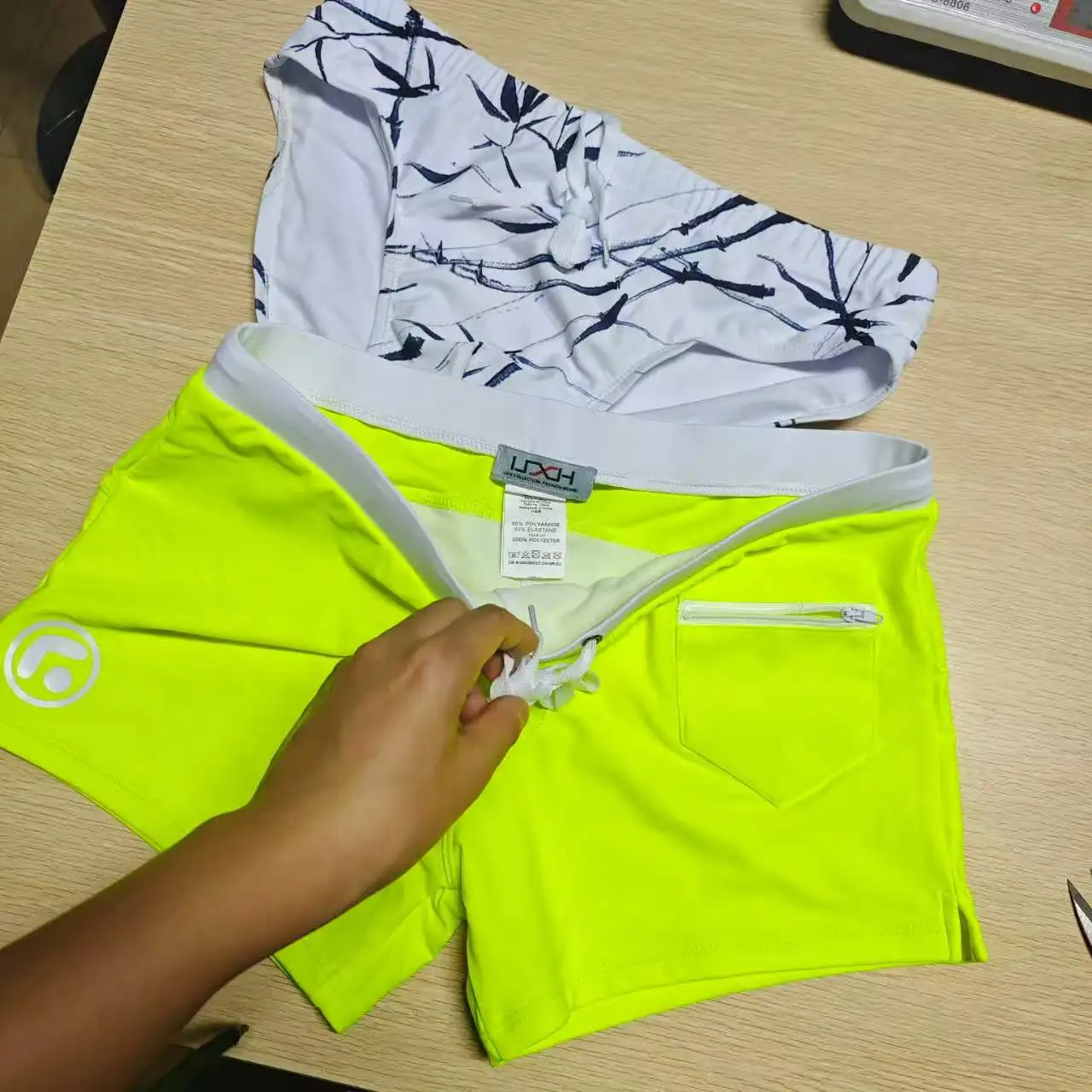 2026Chinese style men's printed white triangle swimming trunks bamboo texture close-fitting beach hot spring pants U035