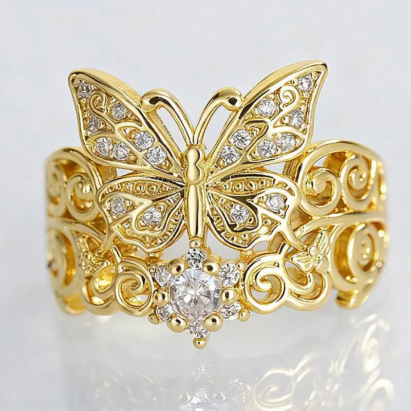 Huitan Damenring mit Schmetterlingsdesign, edles Party-Accessoire in Goldfarbe, wunderschöner Hochzeitsschmuck mit glänzendem CZ