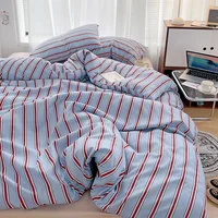 Simple Red and Blue Striped Duvet Cover and Four Piece Bed Sheet Set with Washed Cotton Bedding on the Bed 5
