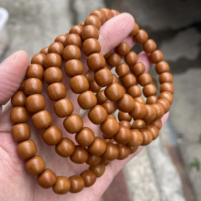 

Houhou bracelet with round carved vintage barrel beads, hand-twisted walnut cultural toy, single-loop men's and women's Buddhist