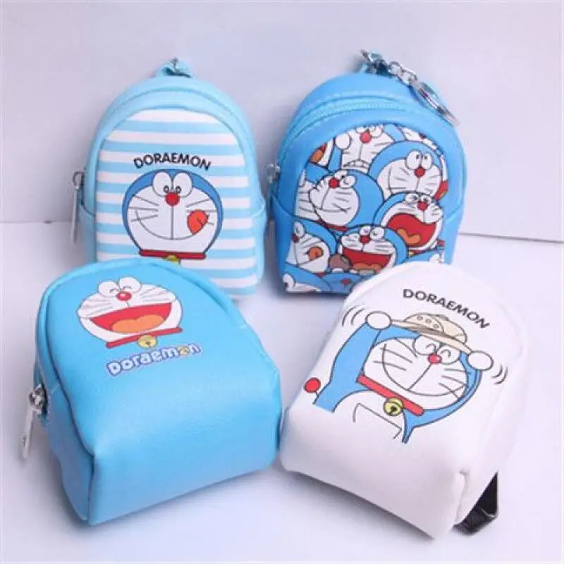 Monedero con forma de mini mochila de cuero sintético Doraemon, mochila pequeña para guardar objetos, colgante decorativo con cremallera, regalo de cumpleaños para un amigo