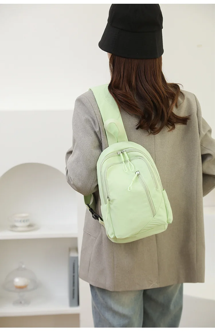 Neue Einfarbig Lässige Umhängetasche Leichte Wasserdichte Nylon Unisex Schulter Sling Rucksack Große Kapazität Reisetasche – Detail 19