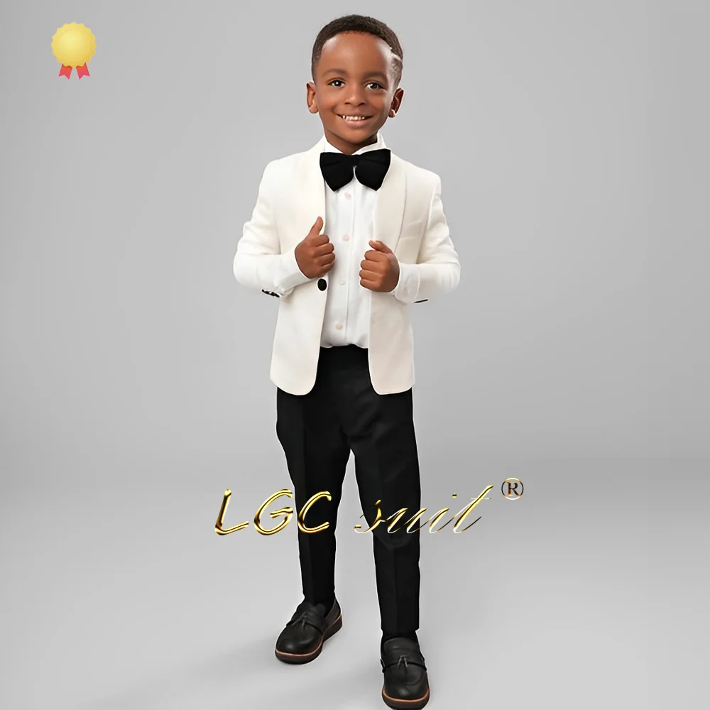 

Boys ivory wedding suit 2 piece set (jacket and black trousers) suitable for children aged 2-16 years old custom tuxedo