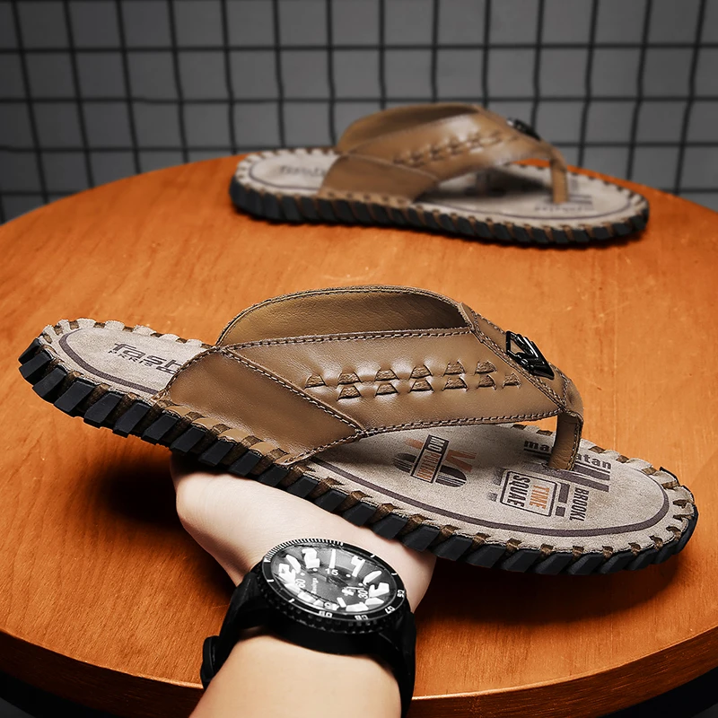 

2024 Summer Men's Slippers Genuine Leather Beach Slippers Outdoor Non slip Flip over Sandals Casual Fashion Leather Sandals