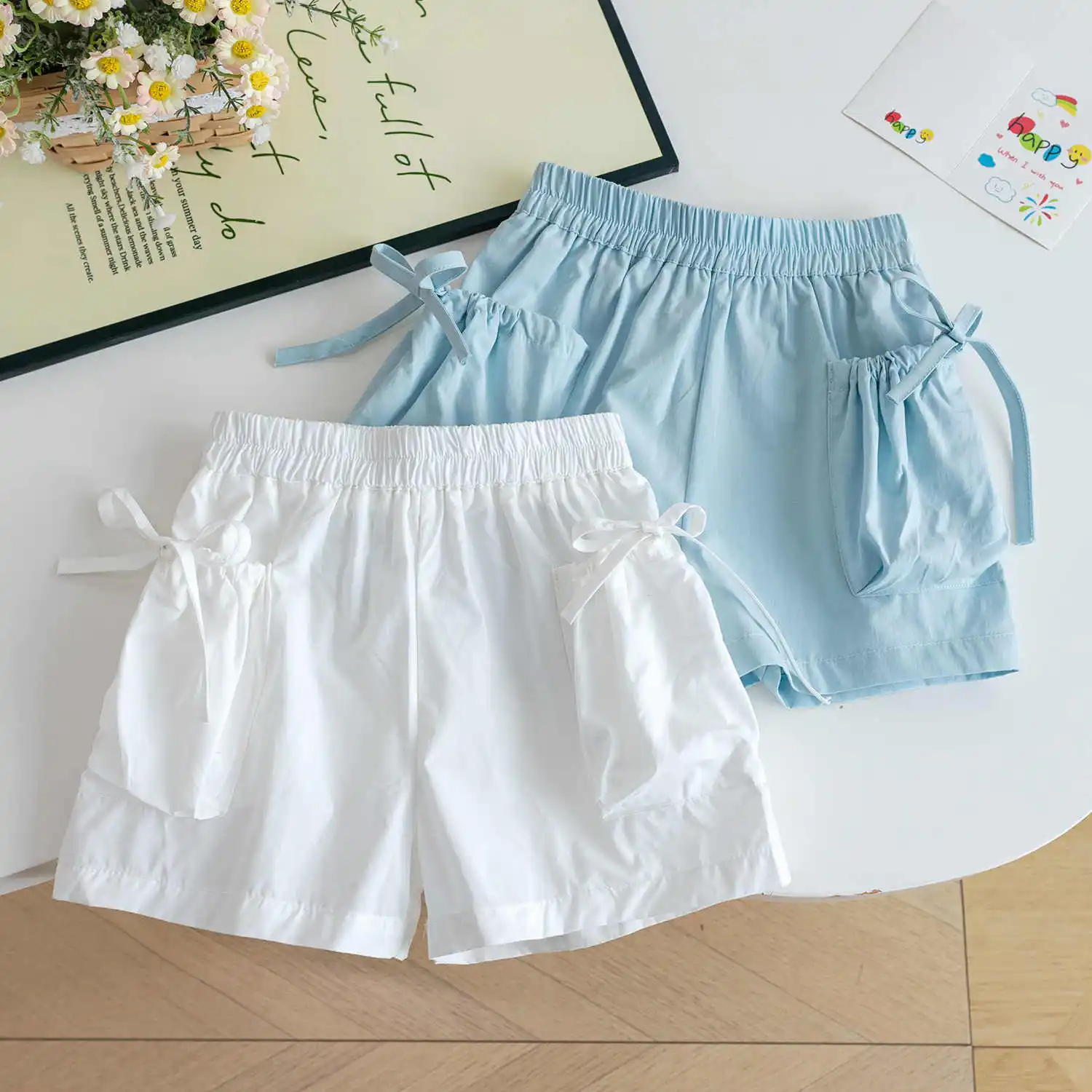 طفل الفتيات السراويل غير رسمية الحلو عقدة شعر للفتيات جيب كبير فضفاض رقيقة السراويل القصيرة الصيف الأطفال عارضة الركبة طول السراويل