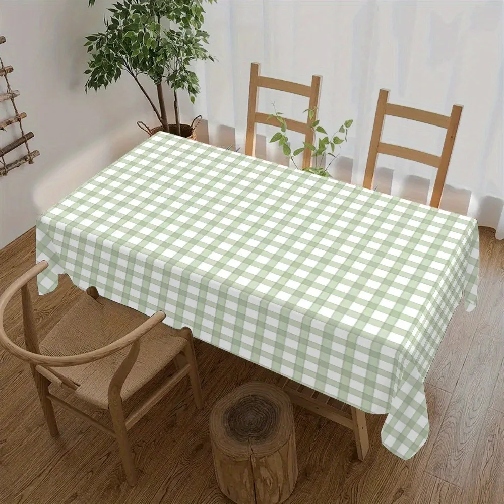A farmhouse-style tablecloth with forest green check pattern. Multi-sized kitchen table set with a retro floral design.