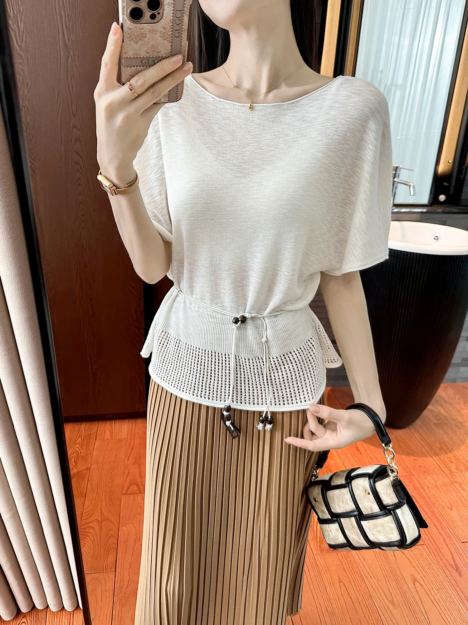 

Breathable Knitted Top with Waist-Cinching Hollow out Hem And Bow Detail Soft Commute Style Loose Fit Short Sleeve round Neck