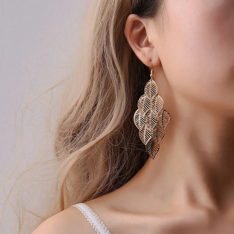 

Stylish and simple gold and silver multi-layer hollow leaf earrings jewelry