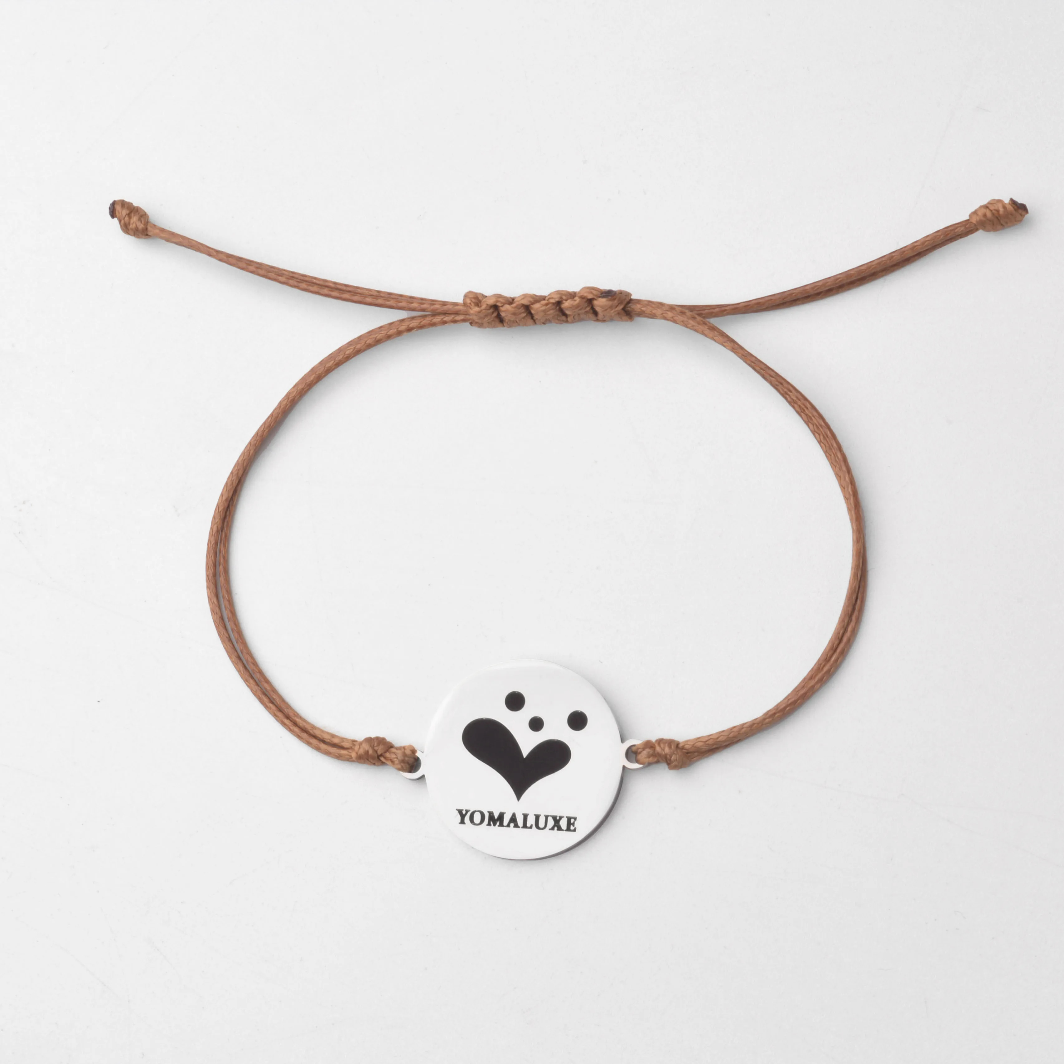 

Yomaluxe Stainless Steel Round Disc Logo Bracelet with Adjustable Brown Cord for Minimalist Everyday Style