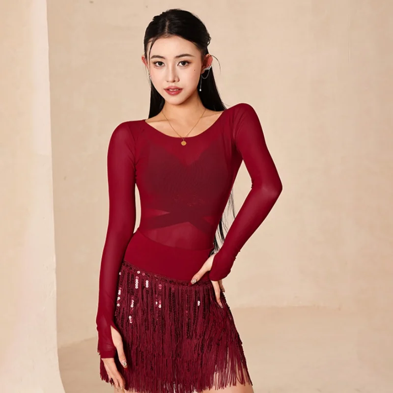 

New Latin dance performance outfit women's sexy mesh long sleeved top and high-end sequin tassel short skirt set Latin clothing