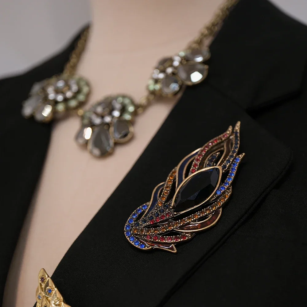 AB/ Copper alloy peacock feather shape design inlaid with colored Zircon women's dress brooch.