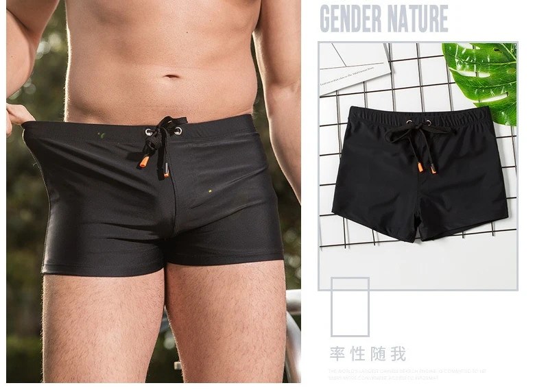 

Wholesale swimming trunks men's professional training racing elastic quick-drying loose solid color men's swimming trunks B002
