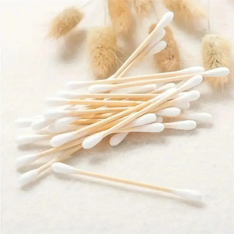 عصي مساحيق تجميل قطنية مزدوجة الأطراف ، قضبان خشبية ، تستخدم لتنظيف الأذنين وإزالة المكياج