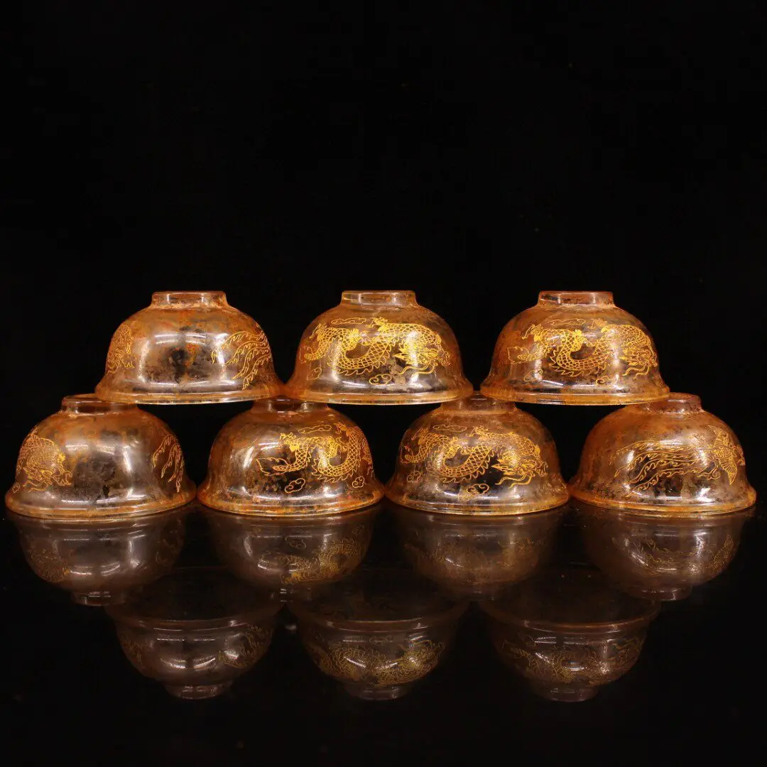 Ancient temple underground palace unearthed antique crystal carved dragon and phoenix gilded offering table set with water bowls