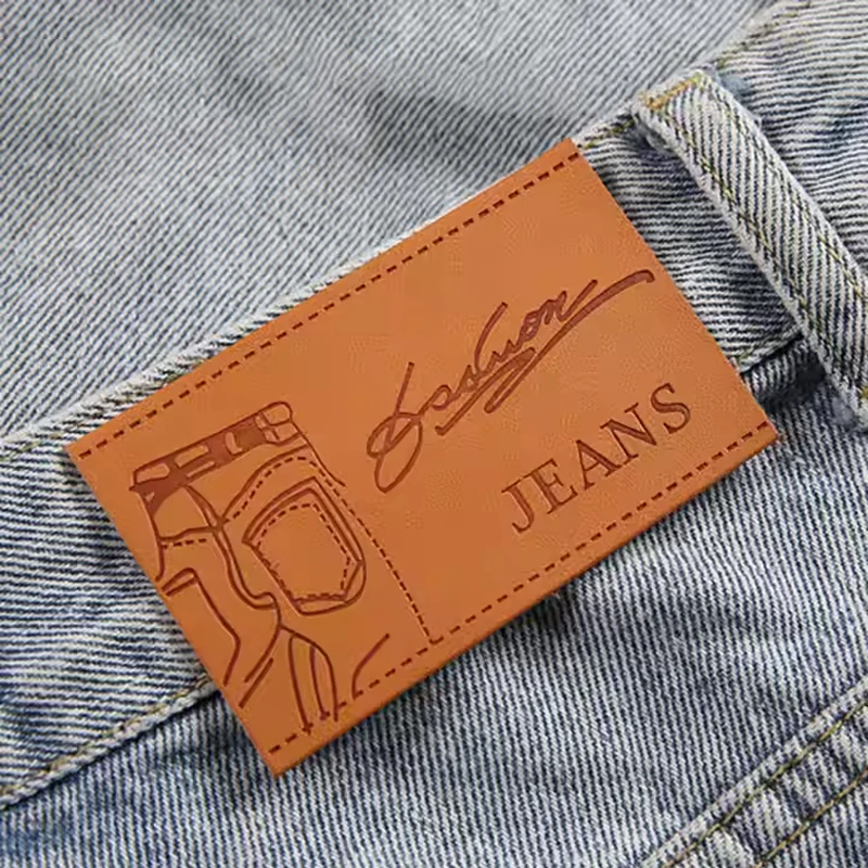 Custom Personalized Embossed Logo Sewing PU Leather Labels Tag for Clothes Garment Jeans view 6