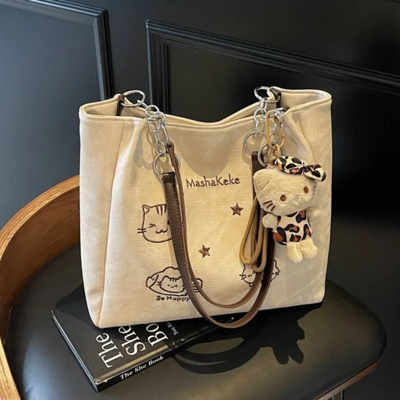 

Kawaii Sanrio Hello Kitty Fashionable and Casual Handbag Versatile Commuting Tote Bag Large Capacity Single Shoulder Armpit Bag