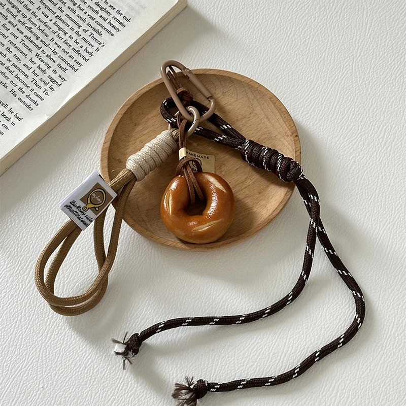 Creative Alkali Water Bread Keychain Cute Smiling Face Bread Woven Rope Pendant Keyring Backpack Decoration Accessories Gifts