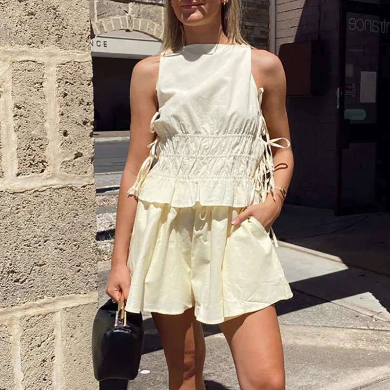 

Стильные однотонные свободные комплекты для отпуска, универсальные женские комплекты для поездок на работу, летние комплекты жилетов без рукавов на шнуровке и шорт с карманами