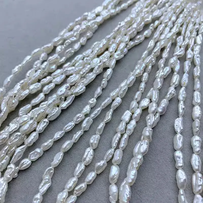 

Freshwater white reborn keshi pearl oval 4-5*7-10mm baroque FPPJ wholesale 39cm nature loose beads for DIY jewelry