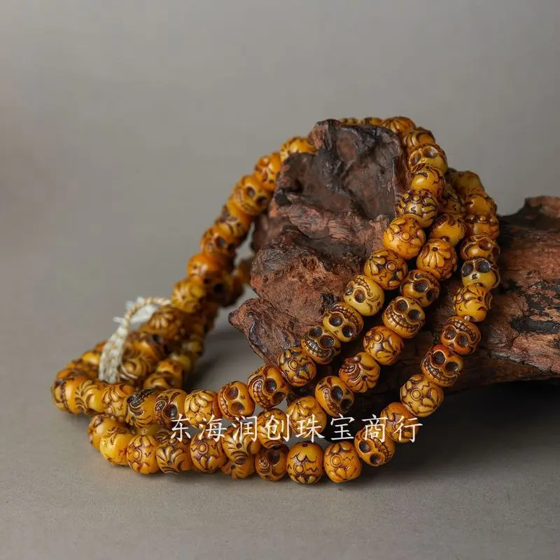 Tibetan-style cow bone carving of the Happy A-Dai108Old agate beads, carved from the main material of the old agate beads