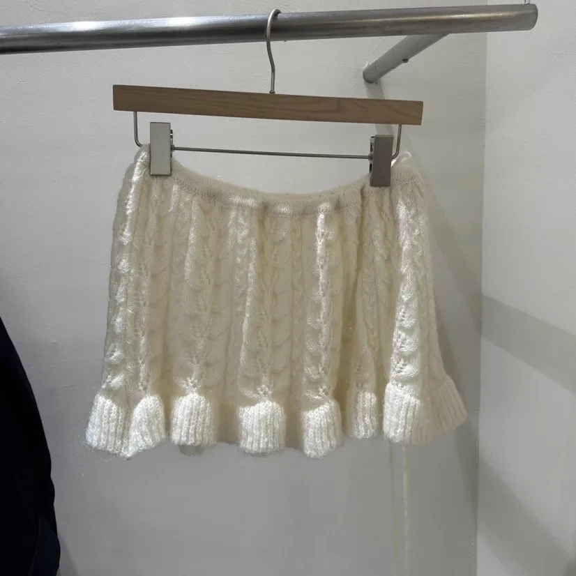 

Вязаная юбка Dongdaemun осенне-зимняя с кружевным ажурным узором, бантом и декором в виде цветов