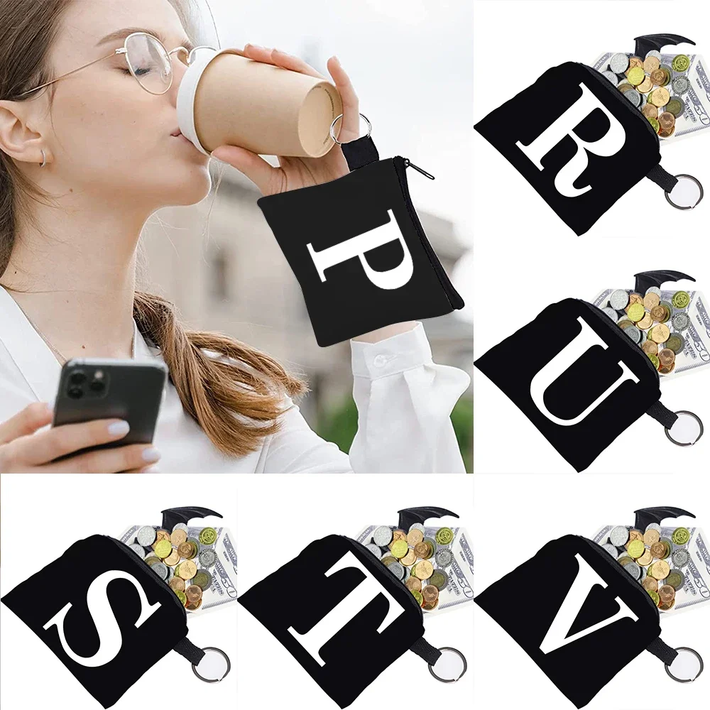 

2024 Women's Wallet Coin Bag Personality Earbuds Key Ring Buckle Storage Bag Black Canvas White Lettter Print Pattern Series
