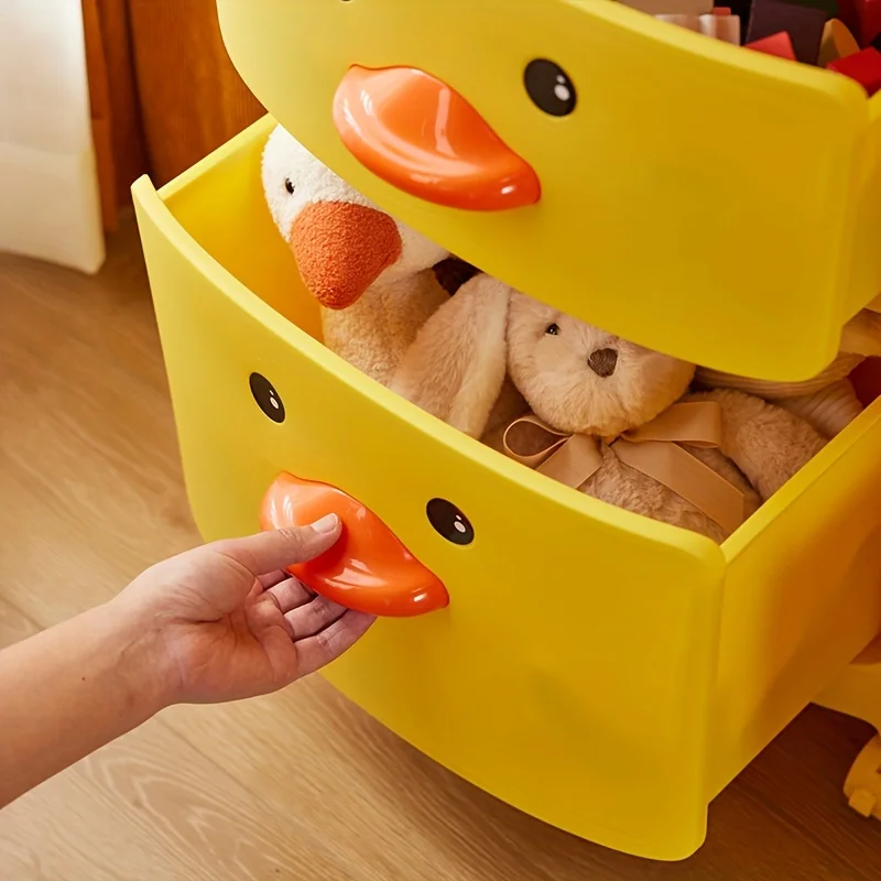 

A cute storage box is very cartoon. It can be moved with pulleys. It can be divided into boxes for toys. It has a simple appear