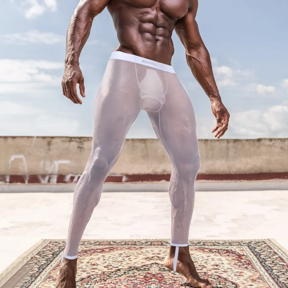 Pantalones sexis transparentes de nueve puntos para hombre, ropa interior deportiva de secado rápido para correr, mallas interiores elásticas ultrafinas para hombre, Calzoncillos largos
