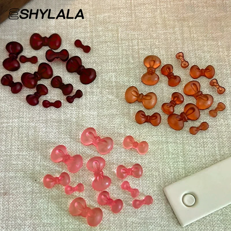 50個入り 冬のリボン 3Dネイルアートアクセサリー 可愛い蝶ネクタイネイルデコレーション DIYレジンネイルチャームミックスパーツ