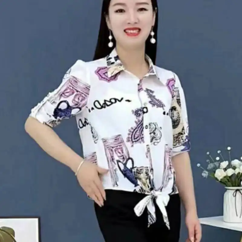 

Women's Spring And Summer New Printed Shirt Lace-up Three-quarter Sleeves Design Sense Niche Fashion Temperament Top DD320