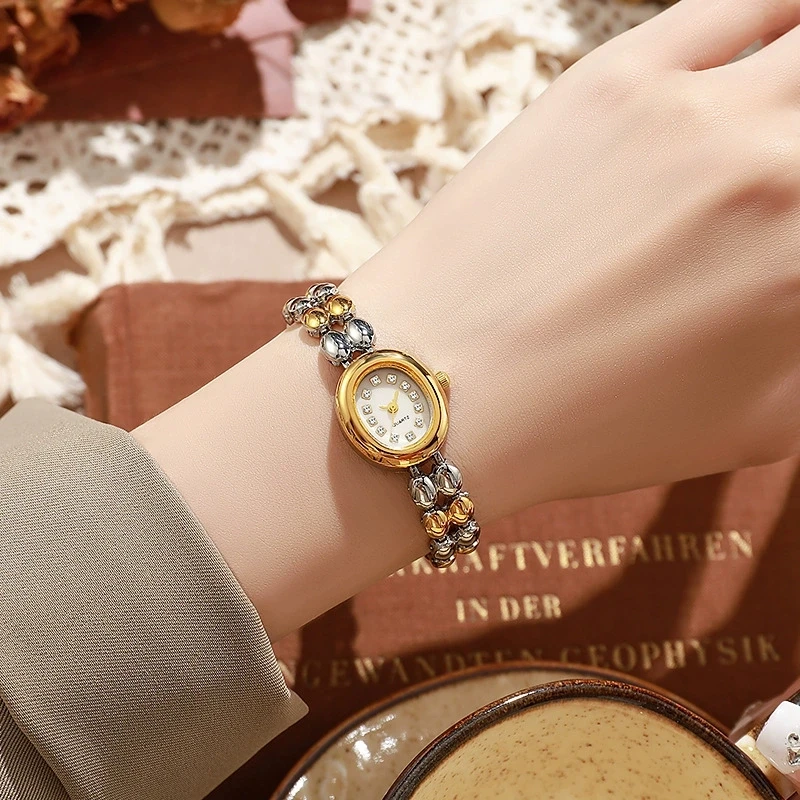 Novo design, mostrador oval de diamante estiloso, design elegante, pulseira, pulseira de aço, relógio de quartzo