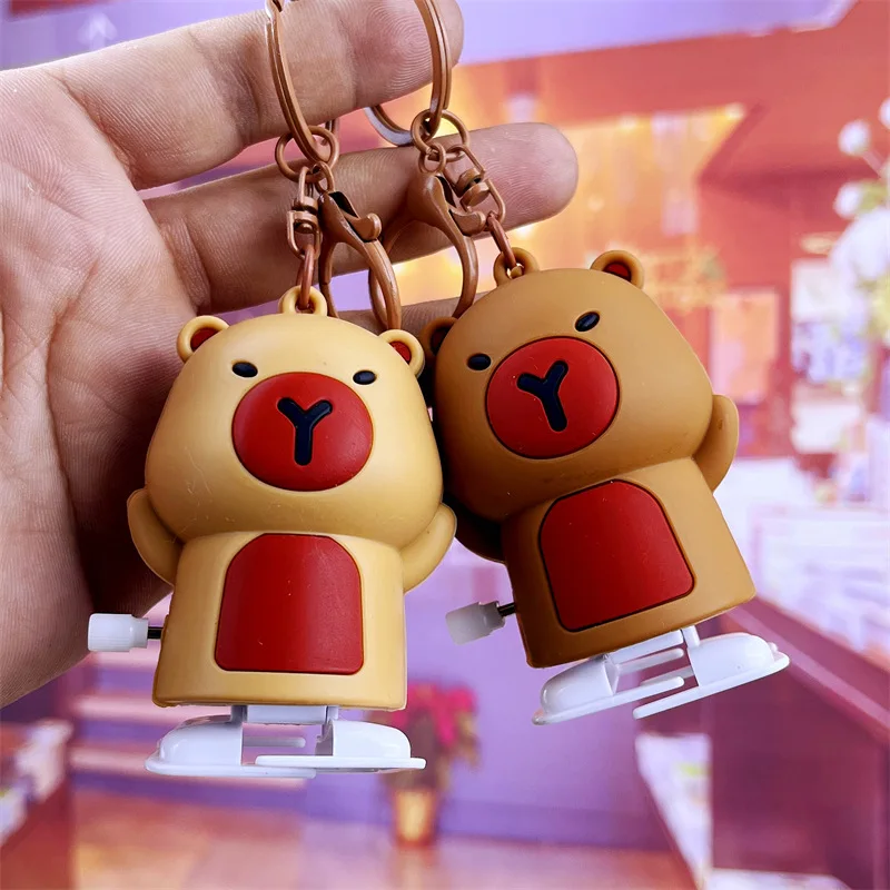 Creativo Clockwork Walking capibara Toy portachiavi Cute Student Bag decorazione Charm Walking capibara Toy BB Barking Doll Charms