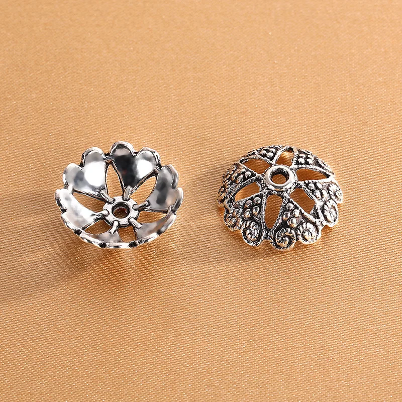 accessori per gioielli fai da te: lega argentata antica che preserva il colore, supporti per fiori retrò scavati, tappetino per cappelli e perline di perline