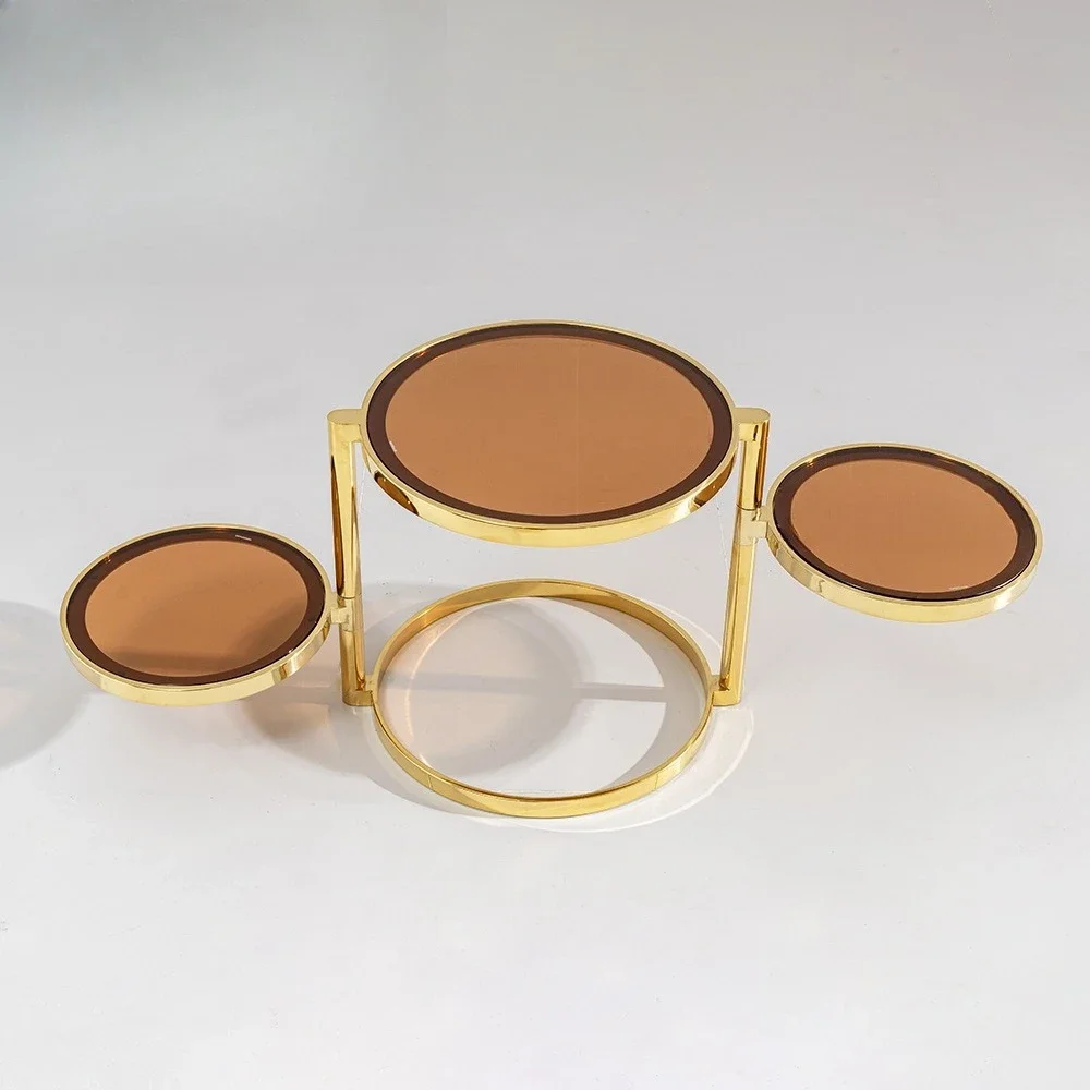 Light luxury round rotating glass coffee table Modern stainless steel designer Small table Internet celebrity furniture