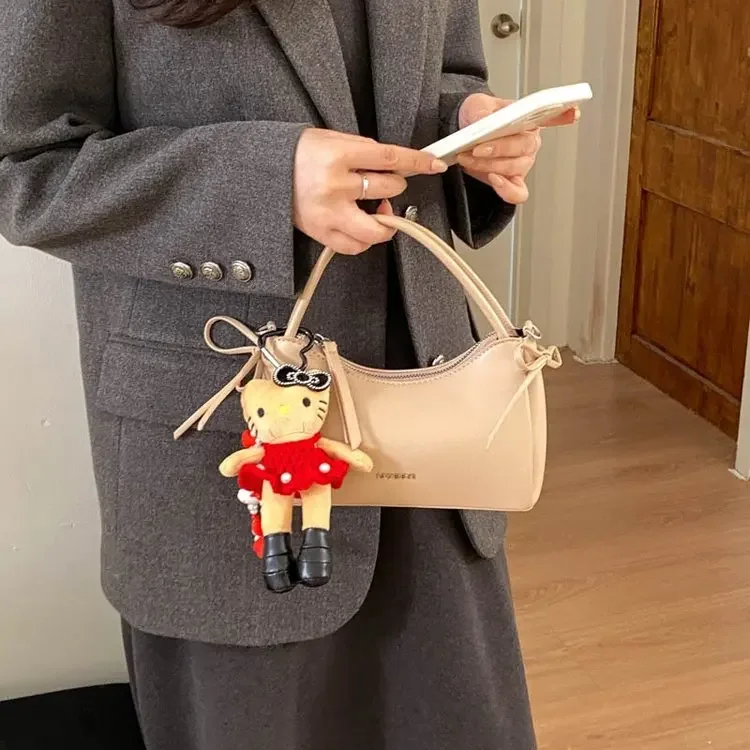 

2026 Korean High-End Women's Solid Color Messenger Shoulder Bag Simple Portable Fashion Commuter Design