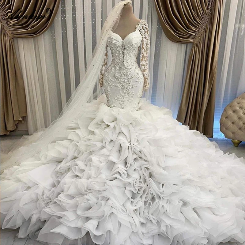 

Alonlivn Vintage Mermaid Wedding Dresses Beading Pearls Appliques Tiered Ruffled Train Full Sleeves Trumpet Bridal Gowns