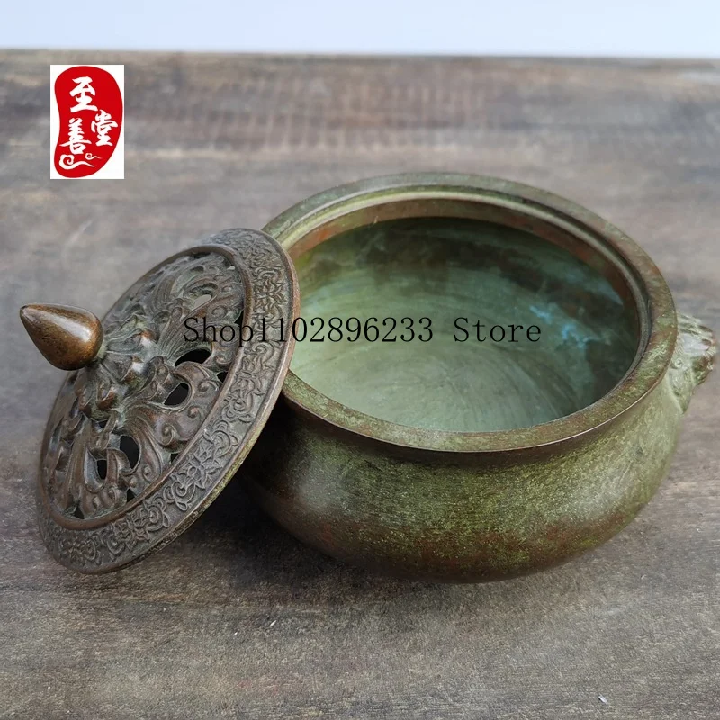 Antique-style alloy copper incense burner with lion ears, designed for living room decoration, showcasing the aged patina of old