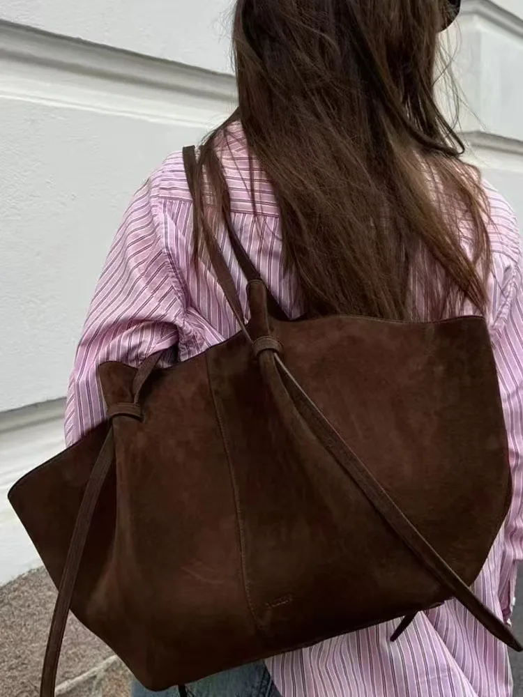 

New trendy versatile tote bag, portable wing bag, large-capacity women's bag, underarm bag, suede matte large-capacity tote bag.
