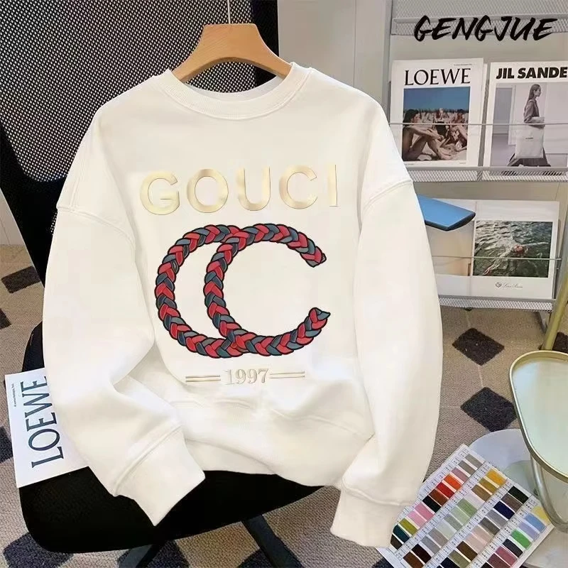 في خريف وشتاء 2025، قمصان شعبية غير رسمية ورياضية للزوجين فضفاضة برقبة دائرية وأكمام طويلة