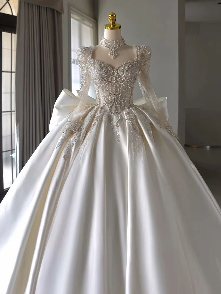 Hochzeitskleid aus Seidensatin Dr. Long Sve Princ Sle Brautkleid Koreanisches Sle mit Perlen Mittlere Taille für den Innenbereich des Hotels
