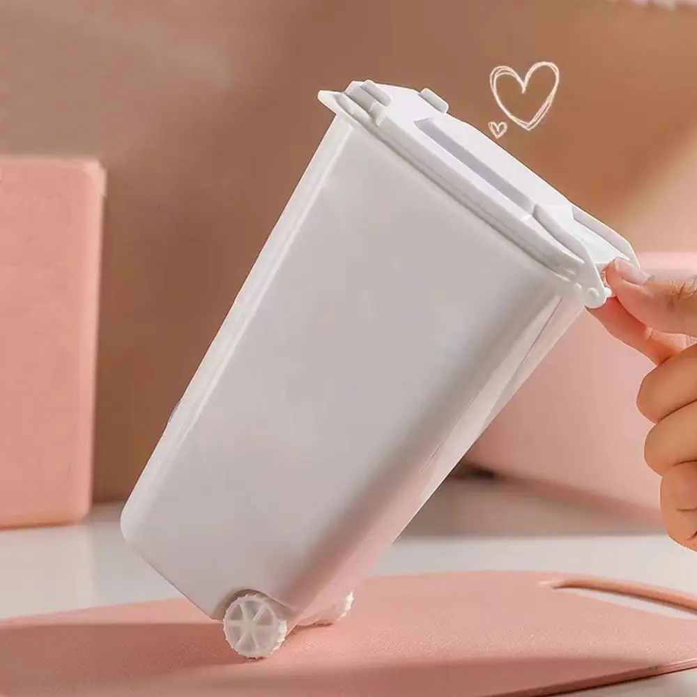 حاوية القمامة الصغيرة حامل القلم مع غطاء على الطاولة الإبداعية سطح المكتب ورقة سلة تخزين دلو القمامة المنظم اللوازم المكتبية