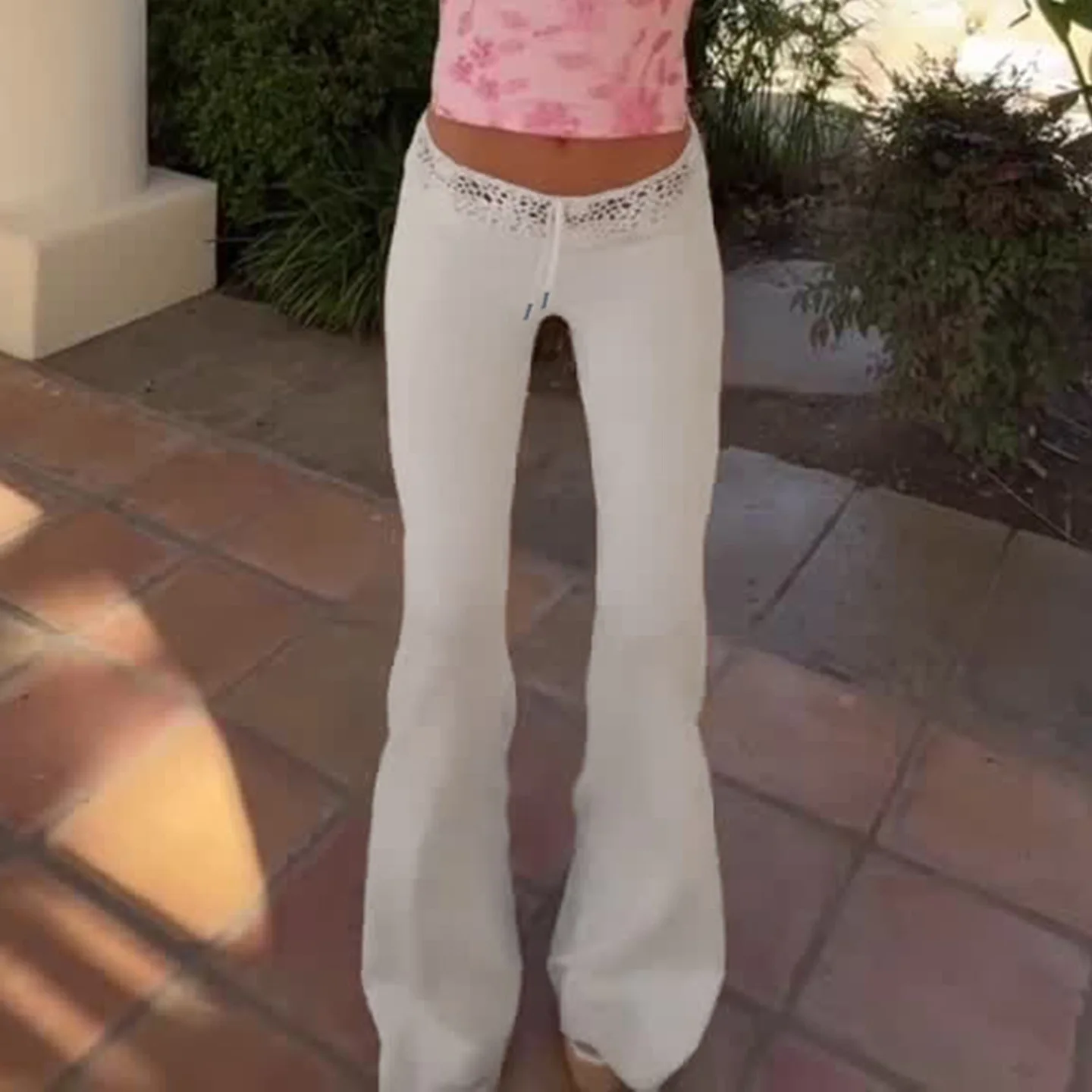 Pantalones informales de punto con campana para mujer, retales de encaje, cordón, cintura elástica, cintura baja, Faion, temporada de otoño, hecho en China